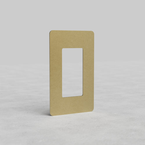 Rectangular 1G Outlet Plate Kew US in antique brass, with central cutout, on plain background.
