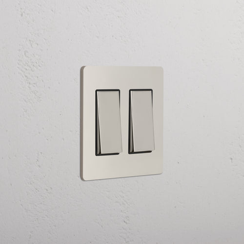 Grove 2G Rocker Switch in polished nickel black finish, featuring two rocker switches on a wall plate.