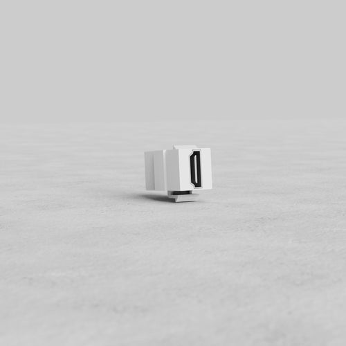 White HDMI Keystone Module shown upright on a light grey surface, designed for AV wall plate installations.