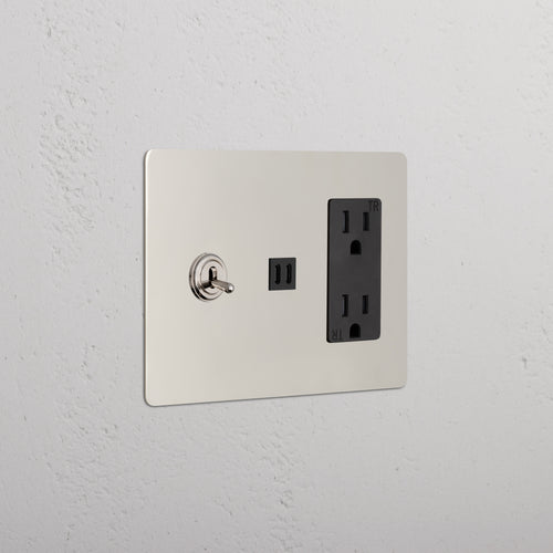 Kew 3G Toggle Switch, Outlet, and Fast Charge USB in polished nickel black finish on a light wall.