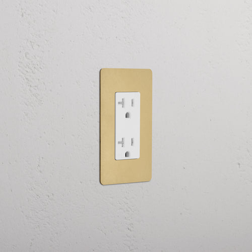 Kew 1G 20A Outlet in white, set on an antique brass white rectangular faceplate.