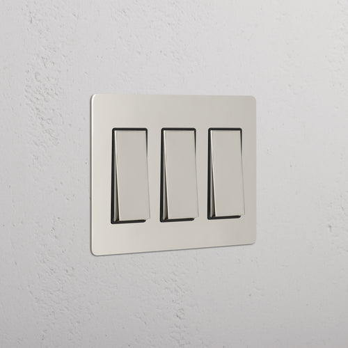 Kew 3G Rocker Switch in Polished Nickel Black finish, mounted on a wall.