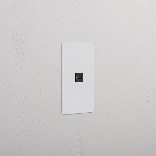 Black paintable 1-gang HDMI keystone faceplate, compatible with Kew inserts, center HDMI port.