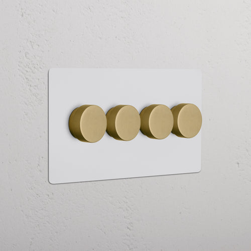 Kew 4G Dimmer Switch – Paintable Antique Brass, with four round dimmer dials on a rectangular wall plate.