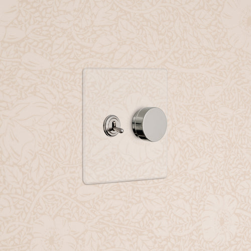 Kew 2G Toggle & Dimmer Switch in clear polished nickel with metallic toggle and round dimmer on clear plate.