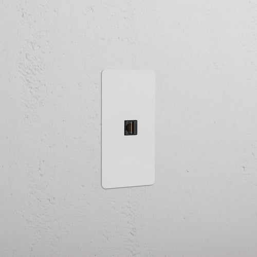 Kew 1G CAT 6 Keystone, paintable black, single-port Ethernet connector for network wall installation.
