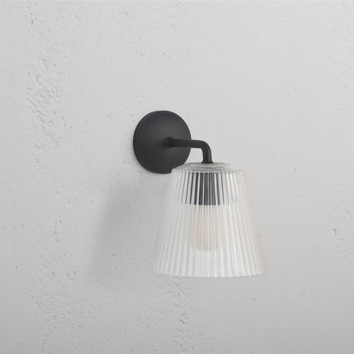 Large Richmond Wall Light Fluted Glass in bronze with clear ribbed glass shade, mounted on a wall.