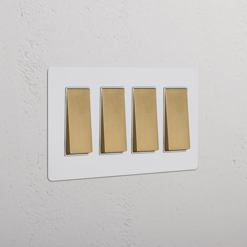 Kew 4G Rocker Switch in Paintable Antique Brass White finish, featuring four white rocker switches.
