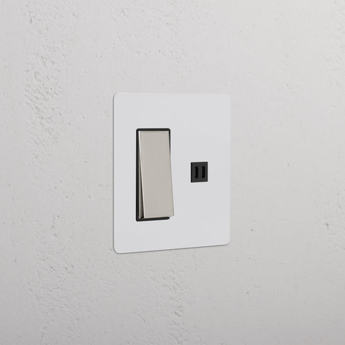 Kew 2G Rocker Switch & Fast Charge USB in paintable polished nickel black, mounted on a wall.
