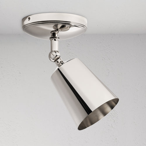 Baylis Single 70mm Spotlight in polished nickel with a sleek cylindrical shade, mounted on a ceiling.