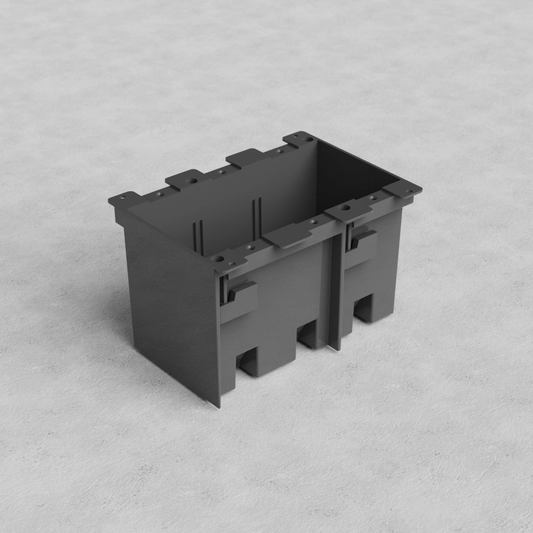 Black plastic 3G US Old Work Electrical Box with reinforced edges and cutouts, shown on a gray surface.