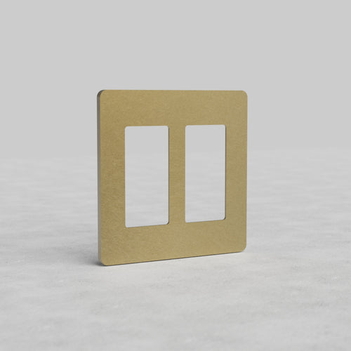 Antique Brass 2G Outlet Plate Grove US with two rectangular openings for electrical outlets, shown upright.