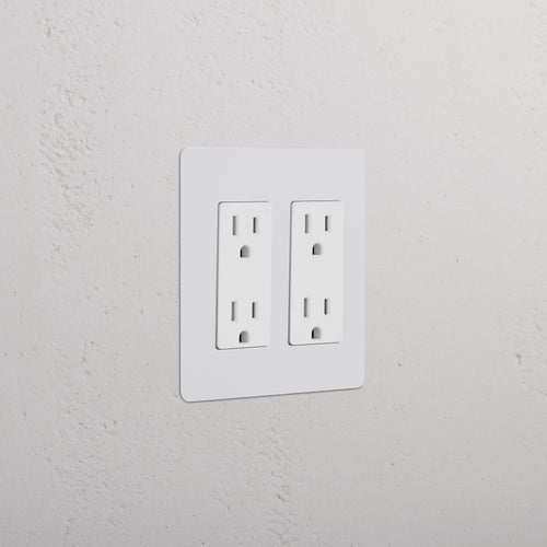 Kew 2G Outlet in paintable white finish, showing two double sockets on a white wall.