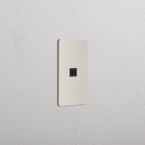 Grove 1G Fast Charge 65W USB Keystone in Polished Nickel Black set on a white wall plate.