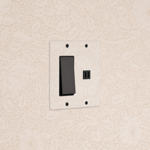 Kew 2G Rocker Switch & Fast Charge USB in clear bronze black finish, mounted on a wall.