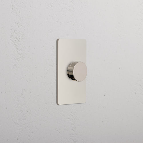 Grove 1G Dimmer Switch in polished nickel, featuring a round knob and modern design, wall-mounted.