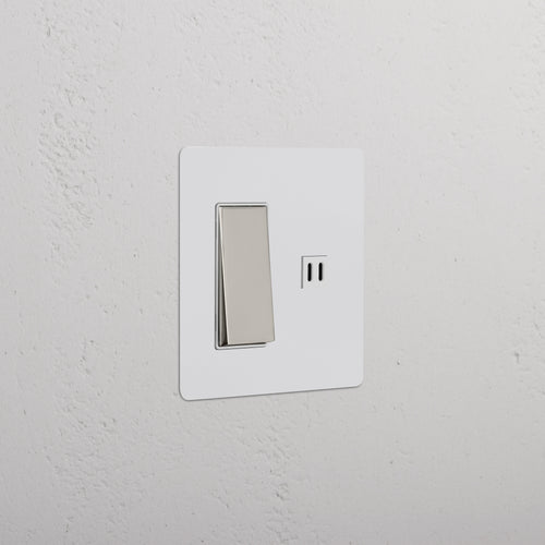 Kew 2G Rocker Switch & Fast Charge USB with paintable polished nickel white faceplate, installed on wall.