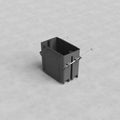 1G US New Work Electrical Box in black plastic with metal screws, shown on a light gray textured surface.