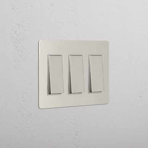 Kew 3G Rocker Switch in Polished Nickel White featuring three white rocker switches on a rectangular panel.