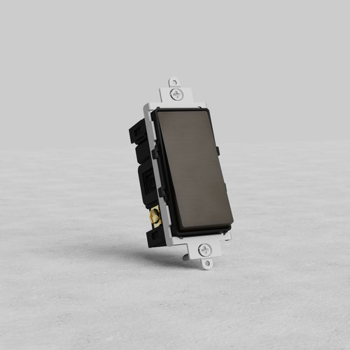 Bronze Black Double Pole Rocker Switch with white mounting bracket, displayed upright on a gray surface.