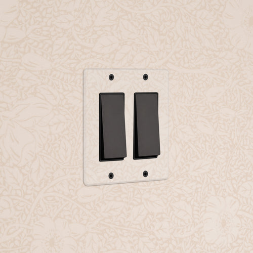 Kew 2G Rocker Switch in Clear Bronze Black finish, featuring two black switches on a stylish faceplate.