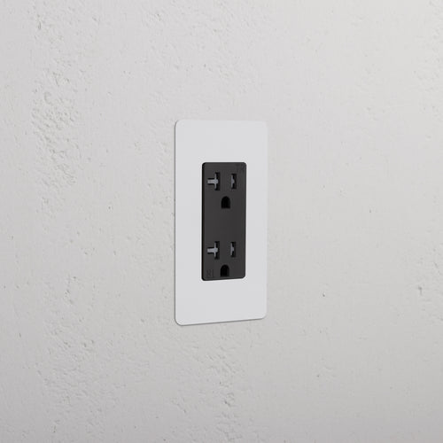Kew 1G 20A Outlet in paintable black with a single outlet on a sleek, rectangular faceplate.