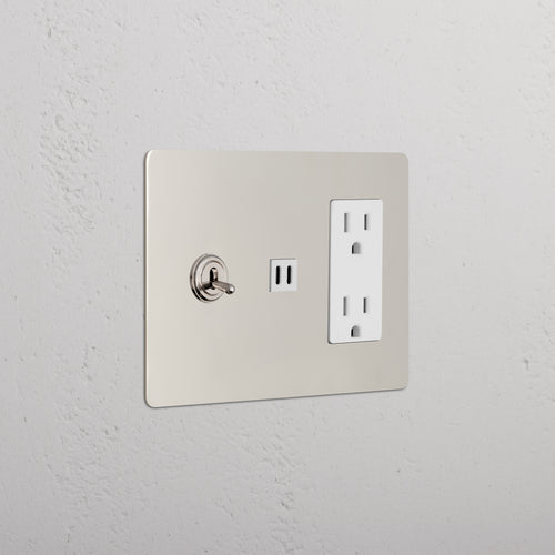 Kew 3G Toggle Switch & Outlet with Fast Charge USB in Polished Nickel White, mounted on a white wall.