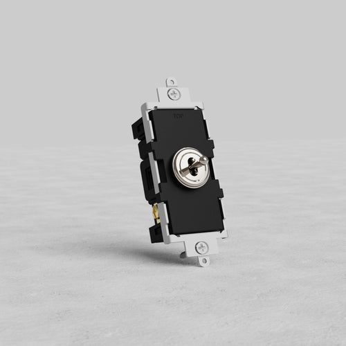 Polished nickel Center Retractive Toggle Switch with sleek finish, shown upright on a light gray surface.