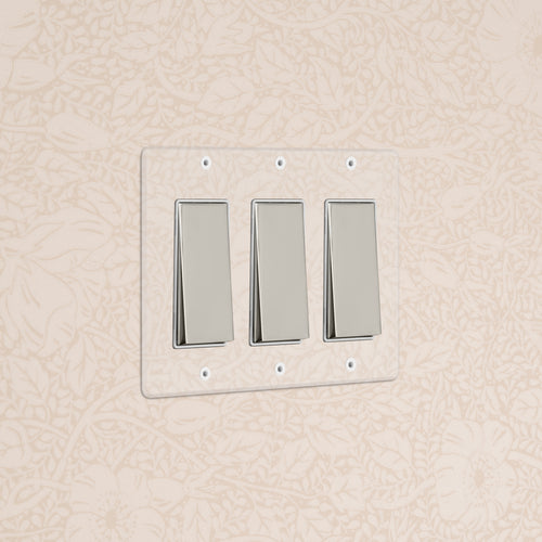 Kew 3G Rocker Switch in clear polished nickel and white finish, mounted on a wall.