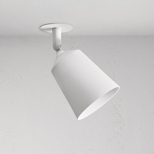 Pembroke Single 70mm Spotlight, white cone-shaped paintable ceiling light, angled downward on a ceiling.