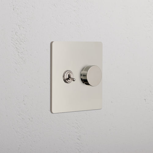 Grove 2G Toggle & Dimmer Switch in polished nickel with toggle and round dimmer on a square plate.