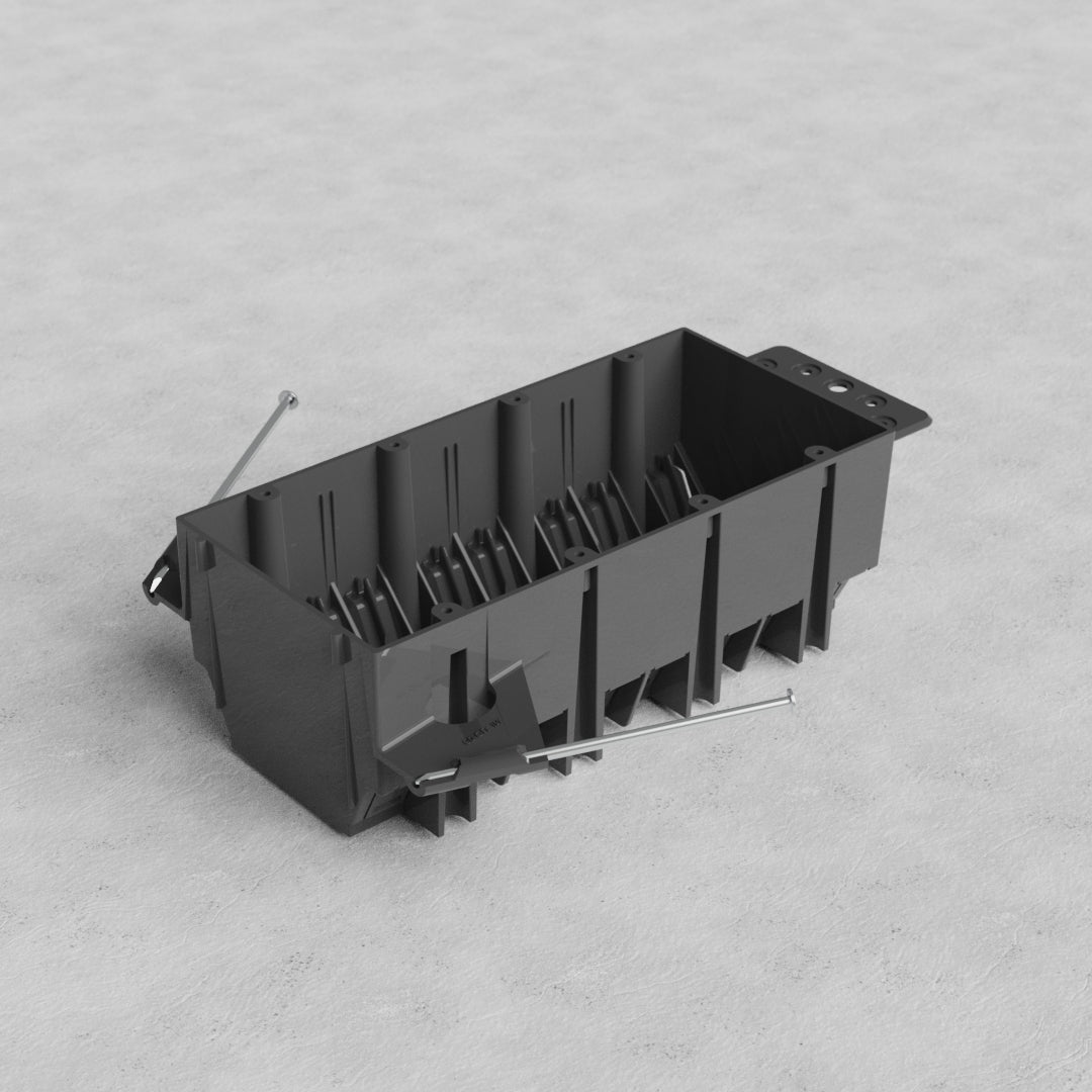 4G US New Work Electrical Box made of black plastic with metal screws, shown on a light grey surface.