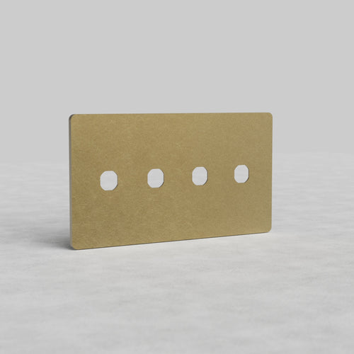 Rectangular 4-gang Antique Brass switch plate with four circular switch cutouts, Grove US style.