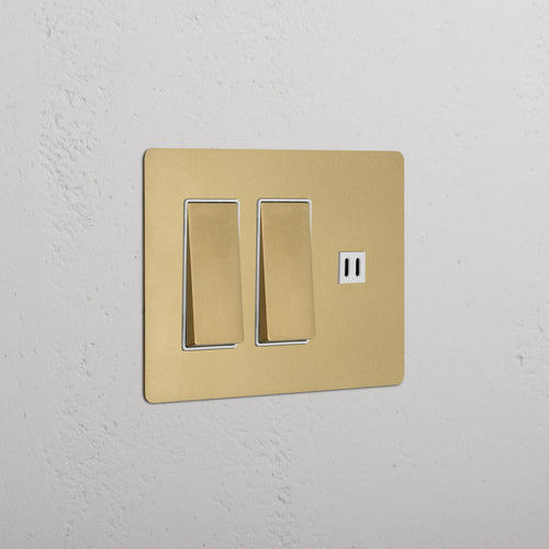 Kew 3G Antique Brass White 2-gang rocker switch plate with fast charge USB port, shown on a wall.