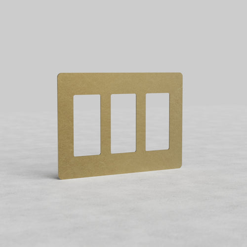 Antique Brass 3G outlet plate Kew US with three vertical outlet slots and gold rectangular frame.