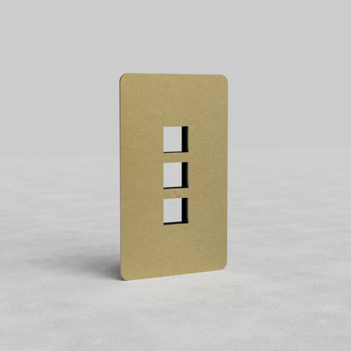 Antique Brass 1G 3x Keystone Plate Kew US with three keystone module openings, shown on a gray background.