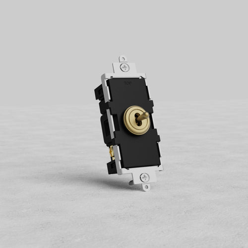 Center Retractive Toggle Switch in antique brass finish, shown upright on a light gray background.