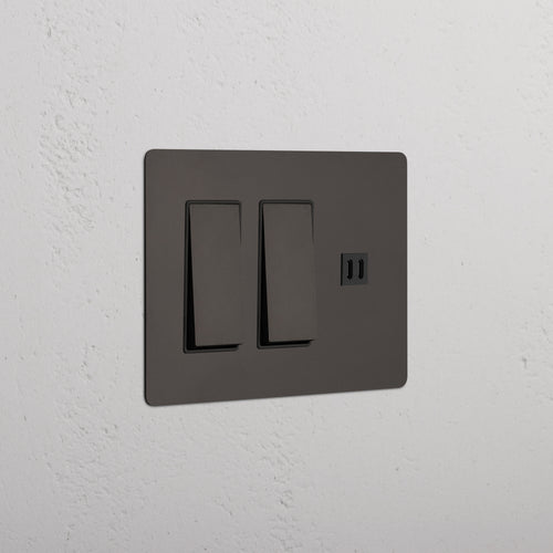 Bronze Black Kew 3G 2x Rocker Switch & Fast Charge USB panel with two switches and USB port on wall.
