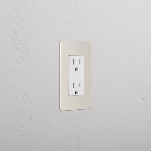 Kew 1G 20A single outlet in Polished Nickel White finish, mounted on a white wall.