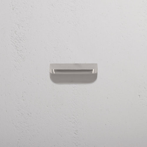 Polished nickel Oxford Furniture Handle Extra Small with a simple, modern design against a white background.